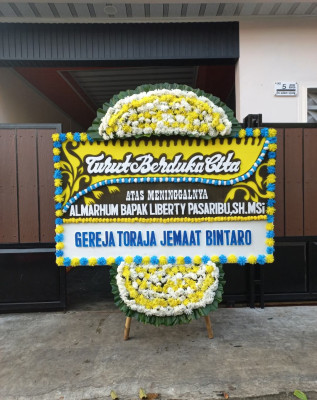 Papan Bunga Duka di Gintung